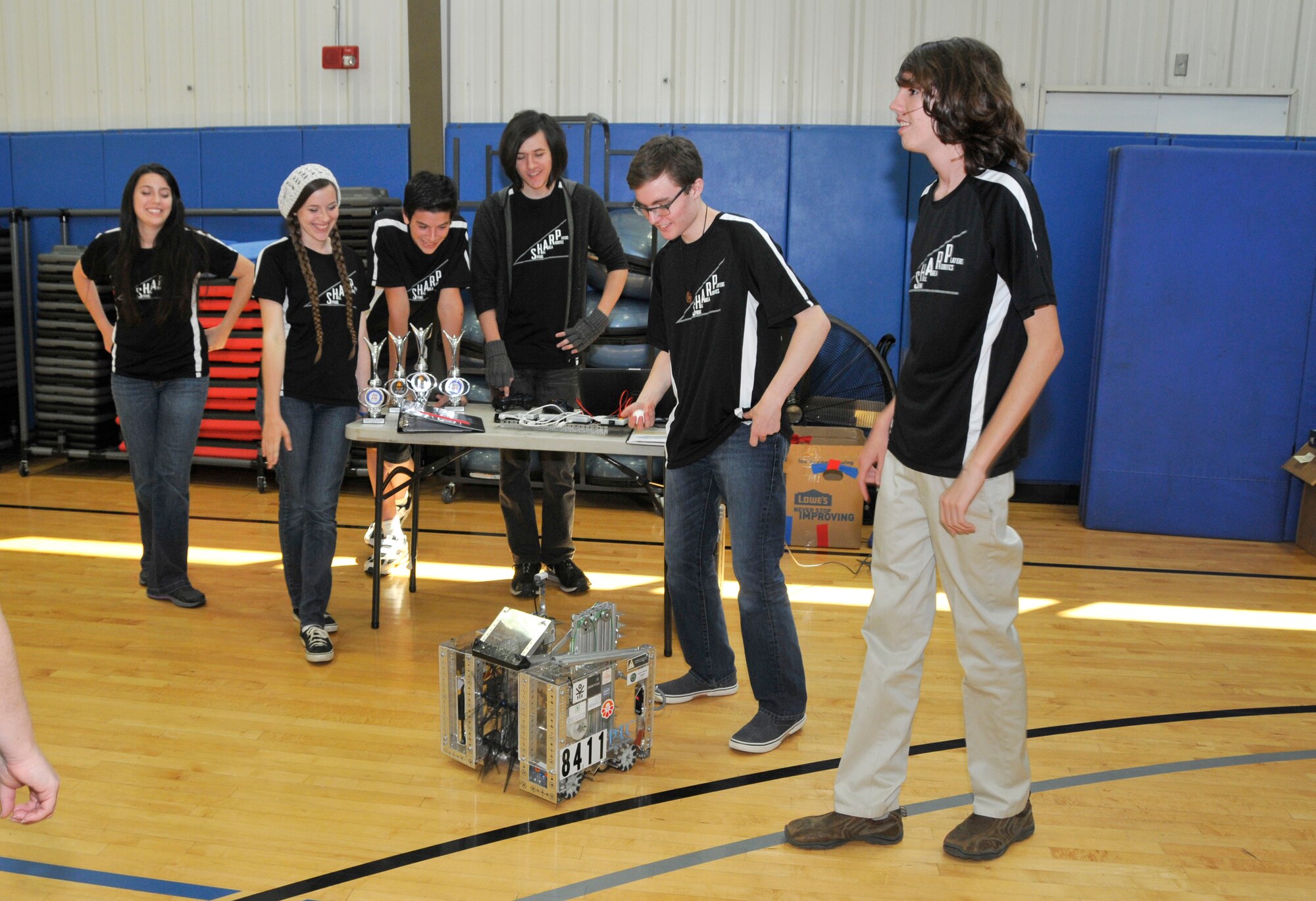 Spring Hill Area Robotics Players FIRST Tech Challenge® Robotics team gave a demonstration of their robot at Arnold Air Force Base on Aug. 27. Team members pictured left to right are Emily Palacios, Julia Palacios, Joseph Palacios, Jarett Ward, Cameron Frazier and Alex Swafford. The team from Maury and Williamson counties, received support from the Arnold Engineering Development Complex Science, Technology, Engineering and Math Center.  FTC robotics students learned more about the engineering processes of developing ideas, planning, designing, building, programming, evaluating solutions and reiterating to make improvements throughout the competition season. (Photo by Jacqueline Cowan)