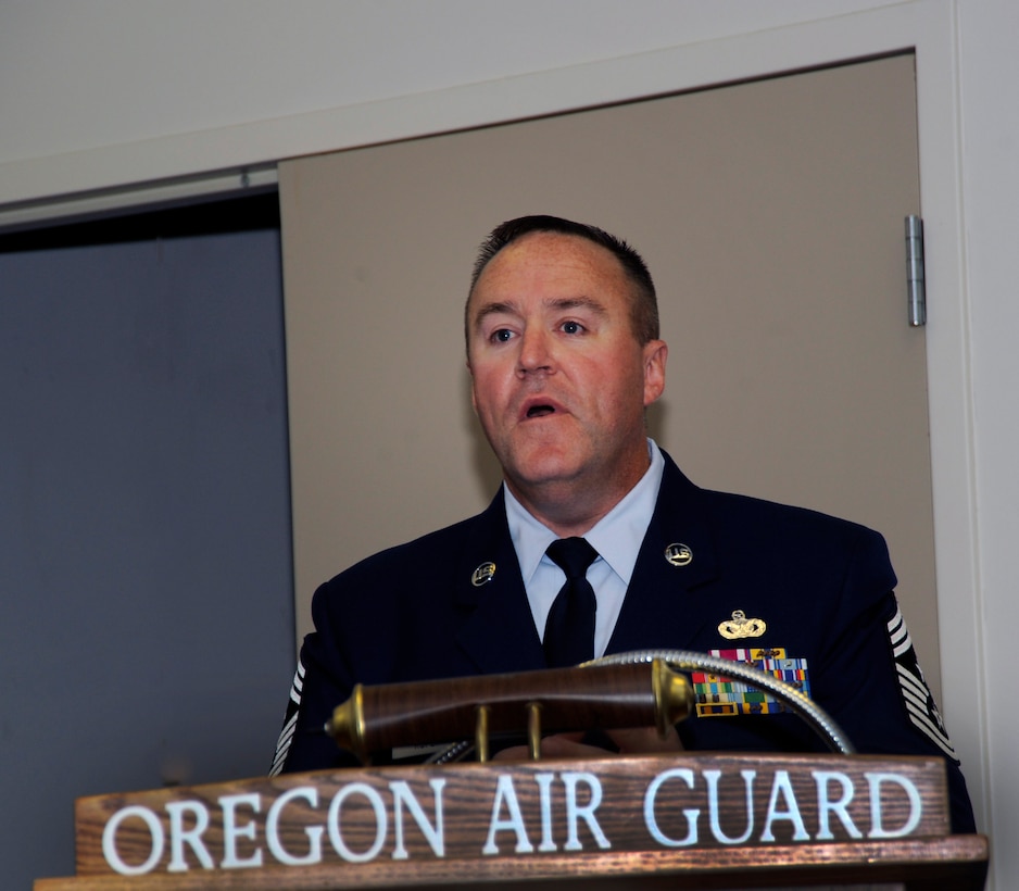 142nd Command Chief Master Sgt. Chris Roper thanks friends and family following a Change of Authority ceremony, Sept. 13, 2015, Portland Air National Guard Base, Ore. (U.S. Air National Guard photo by Tech. Sgt. Aaron Perkins, 142nd Fighter Wing Public Affairs/released)
