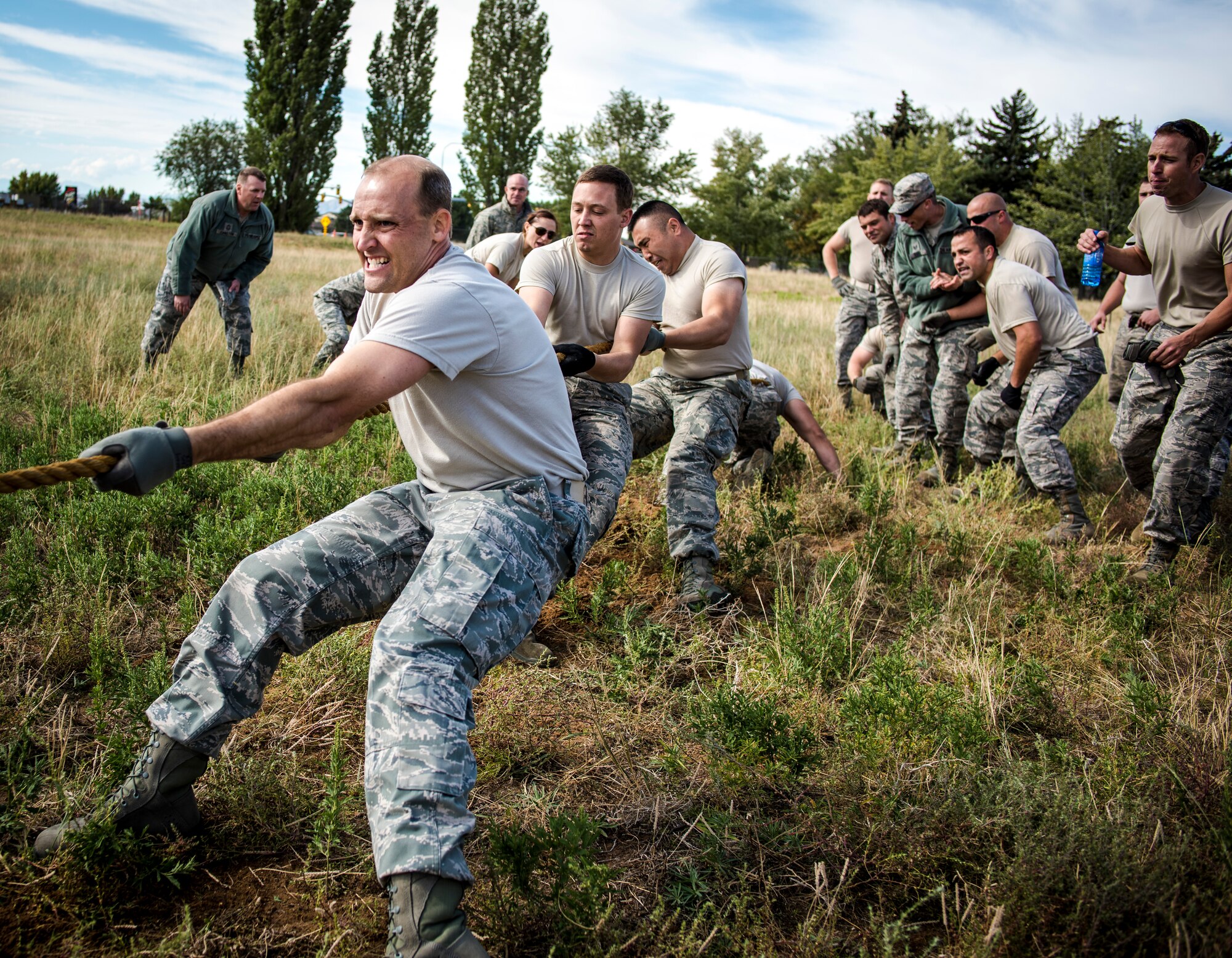 Air Force reservist Tech. Sgt. David Mcalhany, 67th Aerial Porter Squadron, “gives his all” as he digs in his feet at the tug of war challenge held at the Defender’s Cup challenge here Oct. 4.  (U.S. Air Force photo/Tech. Sgt. Michael McCool)