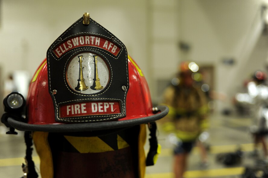 The Ellsworth Fire Department hosted the annual Firefighter Challenge to kick off Fire Prevention Week at Ellsworth Air Force Base, S.D., Oct. 2, 2015. The firehouse also hosted an open house Oct. 3 where attendees had an opportunity to view lifesaving equipment and experience firefighter training. (U.S. Air Force photo by Airman Sadie Colbert/Released)