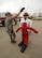 Master Sgt. Kory Henry, 319th Medical Group first sergeant, drags a dummy during the Fire Prevention Week firefighter?s challenge Oct. 8, 2015, on Grand forks Air Force Base, North Dakota. The Rugged Red Drag Rescue Dummy weighed approximately 150 pounds and gave participants an understanding of how heavy a person can be when unconscious. (U.S. Air Force photo by Airman 1st Class Ryan Sparks/Released)