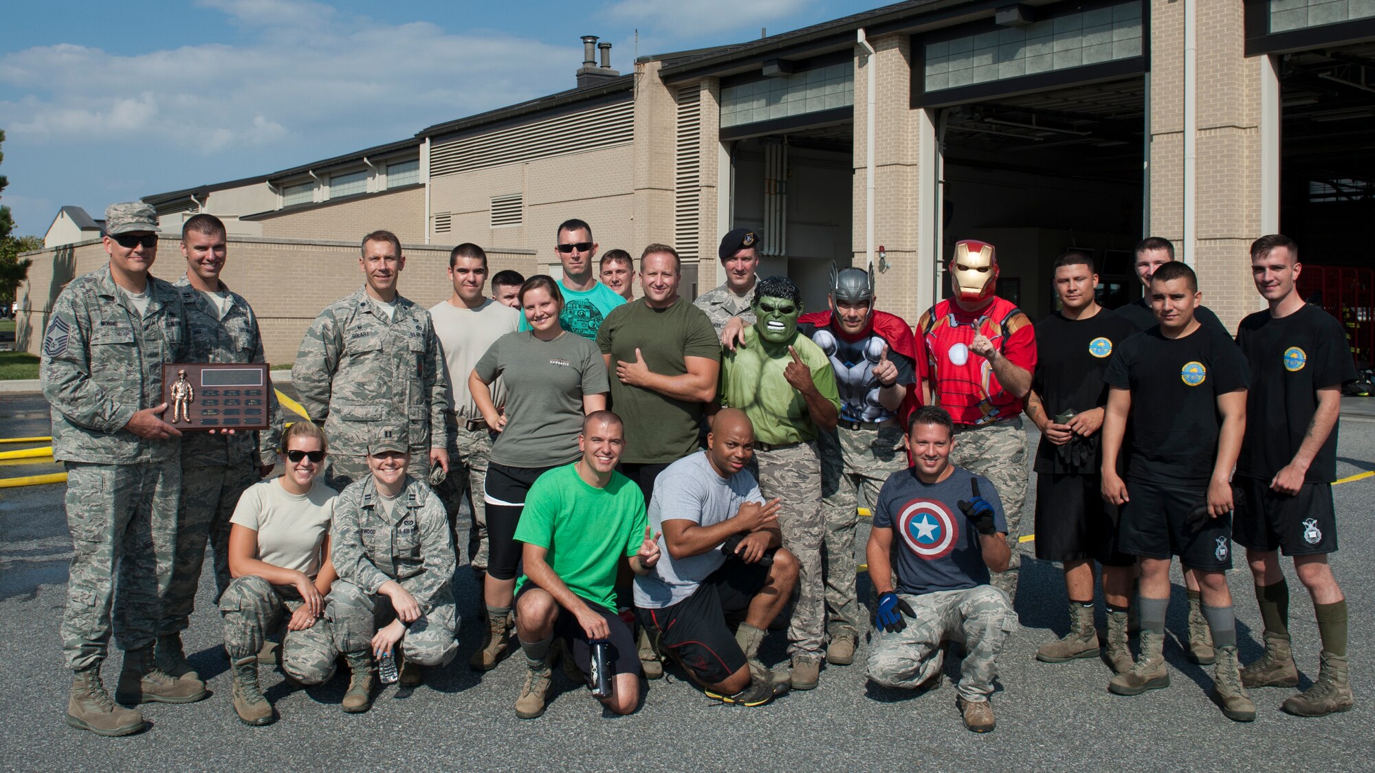 Participants in the 2015 Fire Muster pose for a group photo Oct. 8, 2015, at Dover Air Force Base, Del. The muster was opened to all squadrons on base that wanted to submit a four-man team and was held during Fire Prevention Week. (U.S. Air Force photo/Senior Airman Zachary Cacicia)