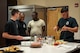 Airmen from the 4th Civil Engineer Squadron fire department make plates of food during their down time, Sept. 17, 2015, at Seymour Johnson Air Force Base, North Carolina. Since the Airmen work 24-hour shifts and are unable to leave their post, they commonly cook and share their own meals in the department’s kitchen. (U.S. Air Force photo/Airman Shawna L. Keyes) 