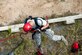 Staff Sgt. Justin Fellure, 4th Civil Engineer Squadron fire department crew chief, repels down an 80-foot tower, Sept. 17, 2015, at Seymour Johnson Air Force Base, North Carolina. Repelling is used when all other exists are blocked and firefighters must use an alternative route out of a building or structure. (U.S. Air Force photo/Airman Shawna L. Keyes)