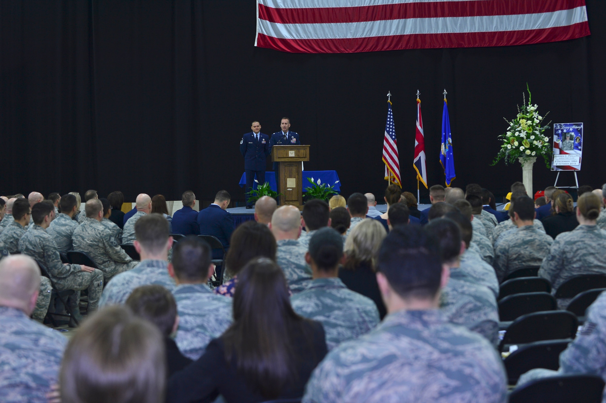 Lt. Col. Ronald Thomas, 48th Equipment Maintenance Squadron commander, gives remarks during a memorial ceremony for Airman 1st Class Darren Phillips, 48th EMS crew chief, at Royal Air Force Lakenheath, England, Oct. 11, 2015. Phillips died from injuries sustained in a motorcycle accident on Oct. 2. (U.S. Air Force photo by Staff Sgt. Stephanie Longoria/Released)