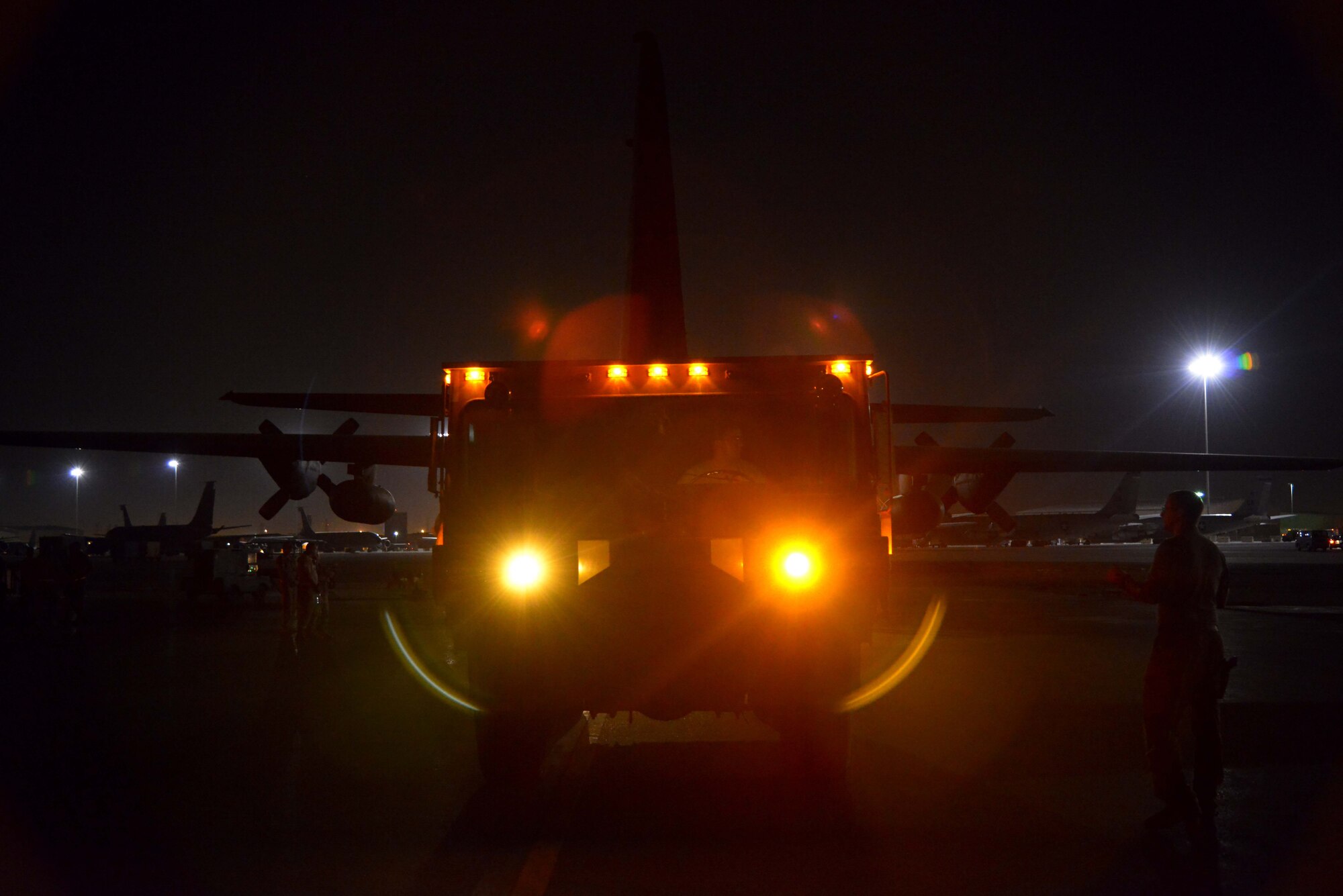 A P-19 Aircraft Rescue Fire Fighting vehicle is driven onto a C-130J assigned to the 746th Expeditionary Airlift Squadron October 12, 2015 at Al Udeid Air Base, Qatar. Aircrew from the 746th EAS received help from Airmen of the 8th Expeditionary Air Mobility Squadron to load the P-19 ARFF vehicle that will be used at a Forward Operating Base. (U.S. Air Force photo/Staff Sgt. Alexandre Montes)