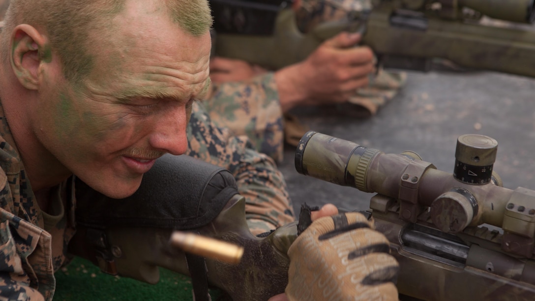 Cpl. Evan D. Taylor cycles the next round into the chamber of a M40A5 Sniper Rifle during a shooting competition between Republic of Korea and U.S. Marines at Baengnyeongdo, Republic of Korea, Sept. 11, 2015. Marines from both countries exchanged weapon systems, methods of concealment, and capabilities throughout the training. The exercise was part of Korean Marine Exchange Program 15-13, a bilateral training exercise that enhances the ROK and U.S. alliance, promotes stability on the Korean Peninsula, and strengthens ROK and U.S. military capabilities. Taylor, from Lusby, Maryland, is a scout sniper attached to Echo Company, 2nd Battalion, 3rd Marine Regiment, currently assigned to 4th Marine Regiment, 3rd Marine Division, III Marine Expeditionary Force, under the unit deployment program. The ROK Marines are with 6th Force Recon Company, 6th Brigade, 2nd ROK Marine Corps Division. 