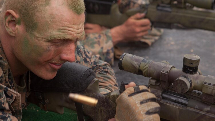 Cpl. Evan D. Taylor cycles the next round into the chamber of a M40A5 Sniper Rifle during a shooting competition between Republic of Korea and U.S. Marines at Baengnyeongdo, Republic of Korea, Sept. 11, 2015. Marines from both countries exchanged weapon systems, methods of concealment, and capabilities throughout the training. The exercise was part of Korean Marine Exchange Program 15-13, a bilateral training exercise that enhances the ROK and U.S. alliance, promotes stability on the Korean Peninsula, and strengthens ROK and U.S. military capabilities. Taylor, from Lusby, Maryland, is a scout sniper attached to Echo Company, 2nd Battalion, 3rd Marine Regiment, currently assigned to 4th Marine Regiment, 3rd Marine Division, III Marine Expeditionary Force, under the unit deployment program. The ROK Marines are with 6th Force Recon Company, 6th Brigade, 2nd ROK Marine Corps Division. 