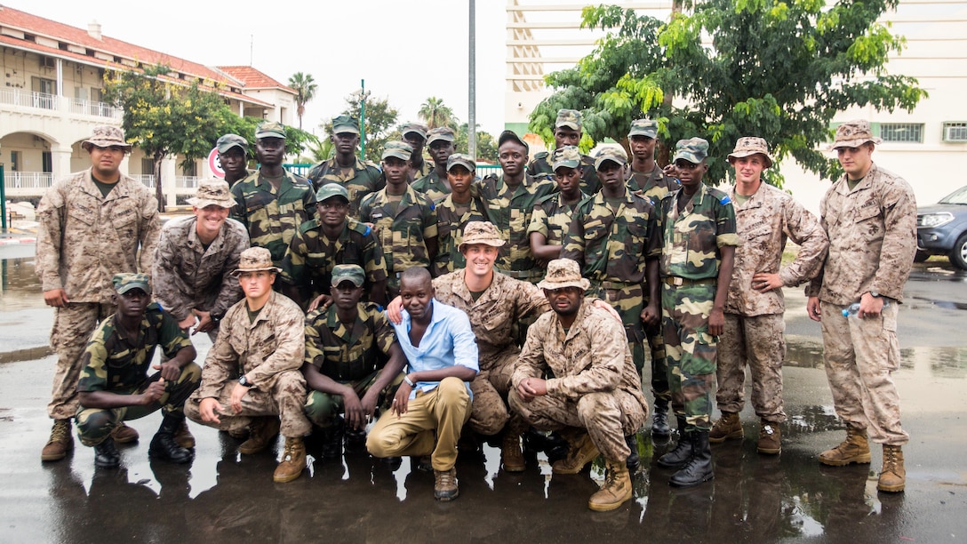 Senegalese military members and U.S. Marines train together aboard Bel-Air military base Sept. 21-22 in Dakar, Senegal. The Marines have spent two days training with Senegalese practicing personnel and vehicle searches while building partnership capacity. 