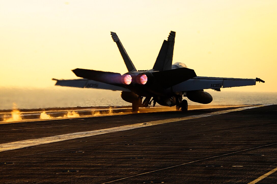 A U.S. Navy F/A-18F Super Hornet launches from the flight deck of the aircraft carrier USS Theodore Roosevelt in the U.S. 5th Fleet area of responsibility, Oct. 10, 2015. The aircraft is assigned to Strike Fighter Squadron 11. U.S. Navy photo by Petty Officer 3rd Class Anna Van Nuys