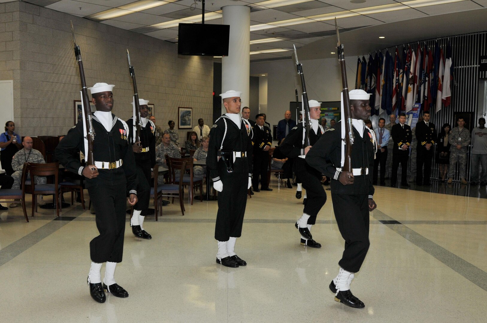 The U.S. Navy Drill Team performs during a Navy birthday celebration at the McNamara Headquarters Complex Oct. 13.