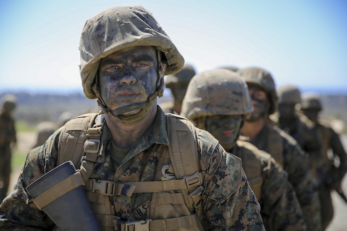Recruit Hunter L. Blackston, Lima Company, 3rd Recruit Training Battalion, stands in formation while a personnel and weapons count is conducted during the Crucible at Edson Range, Marine Corps Base Camp Pendleton, Calif., Oct. 6.  Blackston is a Plugerville, Texas, native and was recruited out of Recruiting Station Austin North, Texas.  Blackston lost 105 pounds in three months to be able to enter Marine Corps recruit training.  He motivated his friends and family to also lose weight and live a healthier lifestyle.  Today, all males recruited from west of the Mississippi are trained at MCRD San Diego. The depot is responsible for training more than 16,000 recruits annually. Lima Company graduated Oct. 16.  