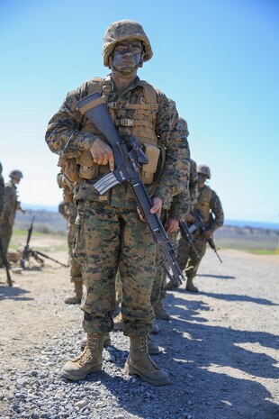 Recruit Hunter L. Blackston, Lima Company, 3rd Recruit Training Battalion, stands in formation while a personnel and weapons count is conducted during the Crucible at Edson Range, Marine Corps Base Camp Pendleton, Calif., Oct. 6.  Blackston is a Plugerville, Texas, native and was recruited out of Recruiting Station Austin North, Texas.  Blackston lost 105 pounds in three months to be able to enter Marine Corps recruit training.  He motivated his friends and family to also lose weight and live a healthier lifestyle.  Today, all males recruited from west of the Mississippi are trained at MCRD San Diego. The depot is responsible for training more than 16,000 recruits annually. Lima Company graduated Oct. 16.  