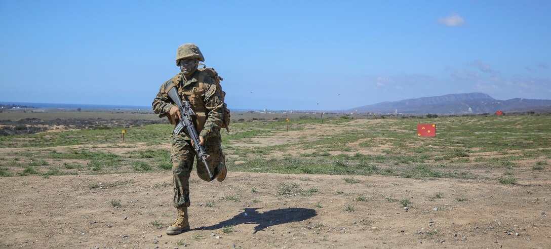 Recruit Hunter L. Blackston, Lima Company, 3rd Recruit Training Battalion, returns to his squad during the Crucible at Edson Range, Marine Corps Base Camp Pendleton, Calif., Oct. 6. Blackston is a Plugerville, Texas, native and was recruited out of Recruiting Station Austin North, Texas.  Blackston lost 105 pounds in three months to be able to enter Marine Corps recruit training.  He motivated his friends and family to also lose weight and live a healthier lifestyle.  Today, all males recruited from west of the Mississippi are trained at MCRD San Diego. The depot is responsible for training more than 16,000 recruits annually. Lima Company graduated Oct. 16.  