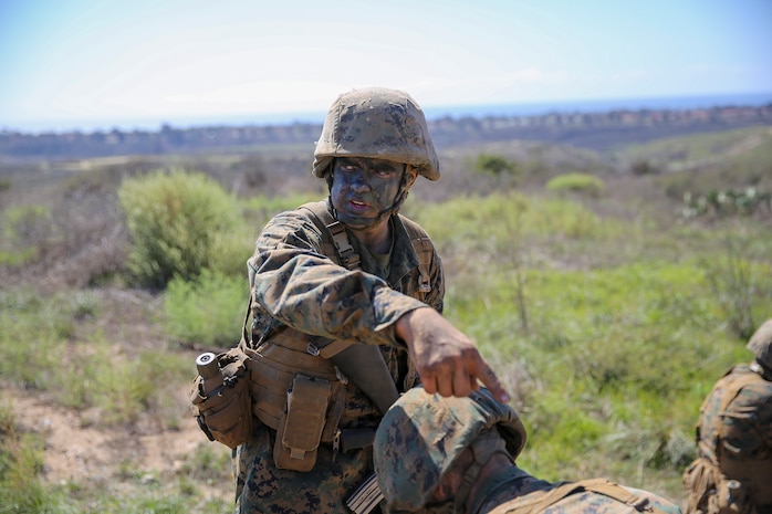 Recruit Hunter L. Blackston, Lima Company, 3rd Recruit Training Battalion, gives out instructions to his fellow recruits during the Crucible at Edson Range, Marine Corps Base Camp Pendleton, Calif., Oct. 6. Blackston is a Plugerville, Texas, native and was recruited out of Recruiting Station Austin North, Texas.  Blackston lost 105 pounds in three months to be able to enter Marine Corps recruit training.  He motivated his friends and family to also lose weight and live a healthier lifestyle.  Today, all males recruited from west of the Mississippi are trained at MCRD San Diego. The depot is responsible for training more than 16,000 recruits annually. Lima Company graduated Oct. 16.  