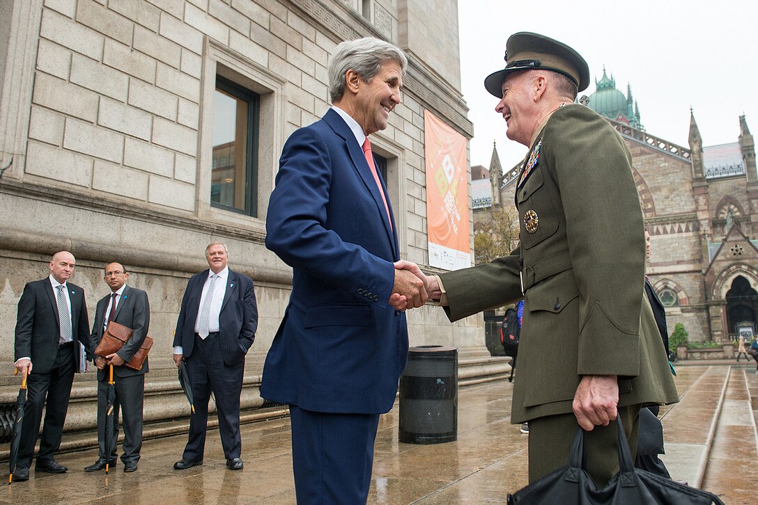 U.S. Marine Corps Gen. Joseph F. Dunford Jr., right, chairman of the Joint Chiefs of Staff, exchanges greetings with Secretary of State John F. Kerry during the 2015 Australia-U.S. Ministerial Consultations in Boston, Oct. 13, 2015. DoD photo by D. Myles Cullen
