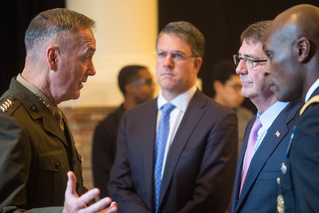 U.S. Marine Corps Gen. Joseph F. Dunford Jr., left, chairman of the Joint Chiefs of Staff, talks with Defense Secretary Ash Carter, second from right, in between meetings during the Australia-U.S. Ministerial Consultations in Boston, Oct. 13, 2015. DoD photo by D. Myles Cullen