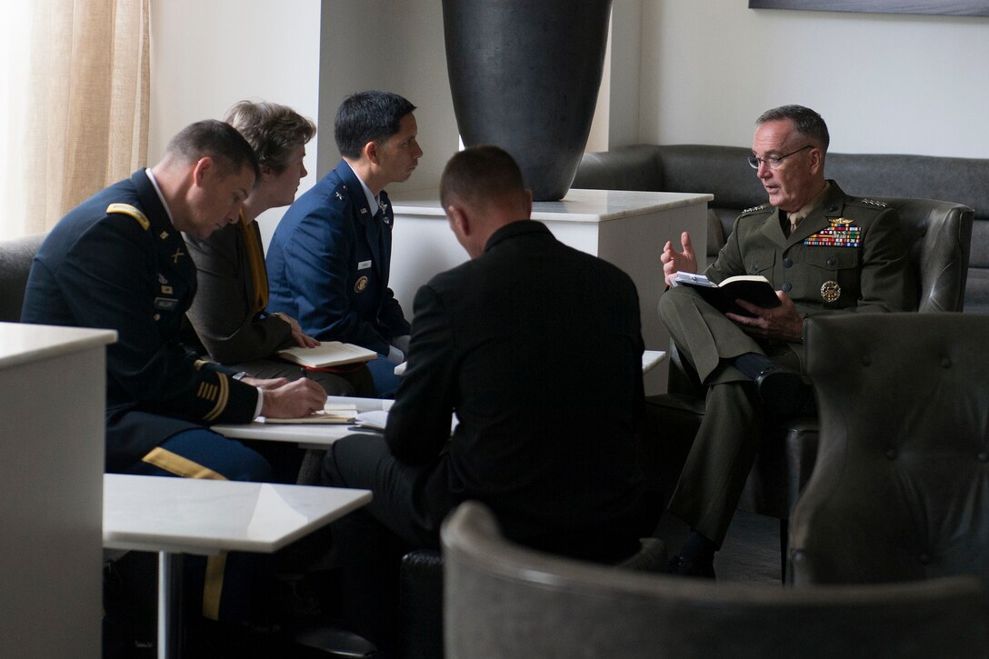 U.S. Marine Corps Gen. Joseph F. Dunford Jr., right, chairman of the Joint Chiefs of Staff, provides guidance to members of the Joint Staff after attending meetings in conjunction with the Australia-U.S. Ministerial Consultations in Boston, Oct. 13, 2015. DoD photo by D. Myles Cullen