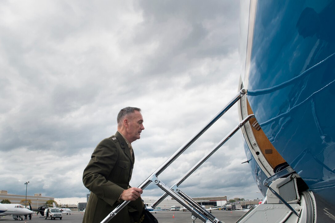 U.S. Marine Corps Gen. Joseph F. Dunford Jr., chairman of the Joint Chiefs of Staff, boards an aircraft before departing from Boston, Oct. 13, 2015. DoD photo by D. Myles Cullen