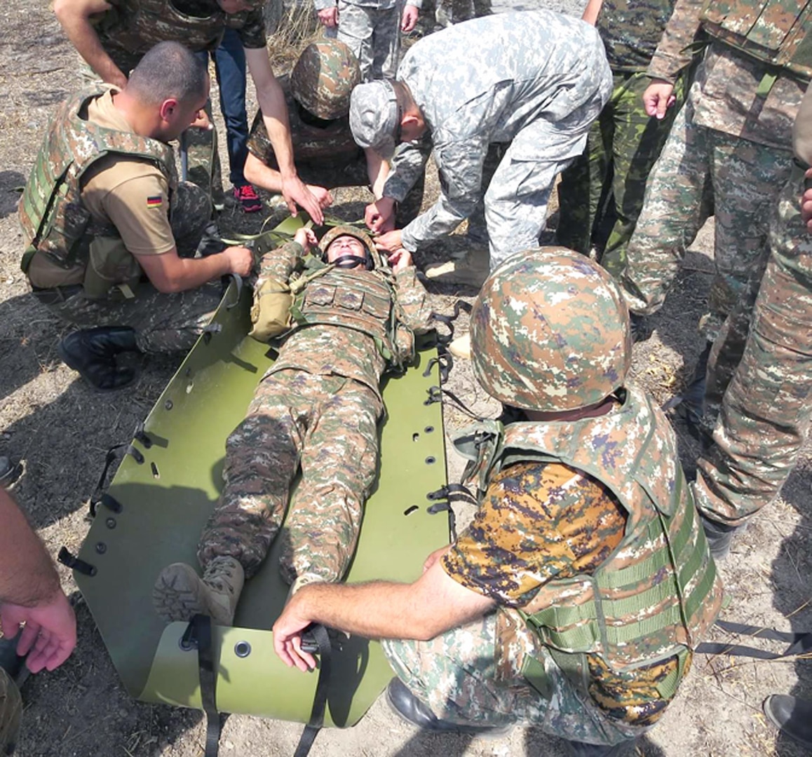 Sgt. 1st Class Victor Miranda, from the 232nd Medical Battalion at Fort Sam Houston, trains Armenian students on the Sked Basic Rescue System. Miranda and four other medic instructors traveled to Armenia to provide U.S. Army’s 68W, Health Care Specialist, training to 12 Armenian medics. After medic training, these newly qualified Armenian medics completed a modified Army Basic Instructor Course which certified them as the initial instructors for the newly formed Armenian Combat Medic School in Yerevan, a first of its kind for the Armenian Armed Forces.