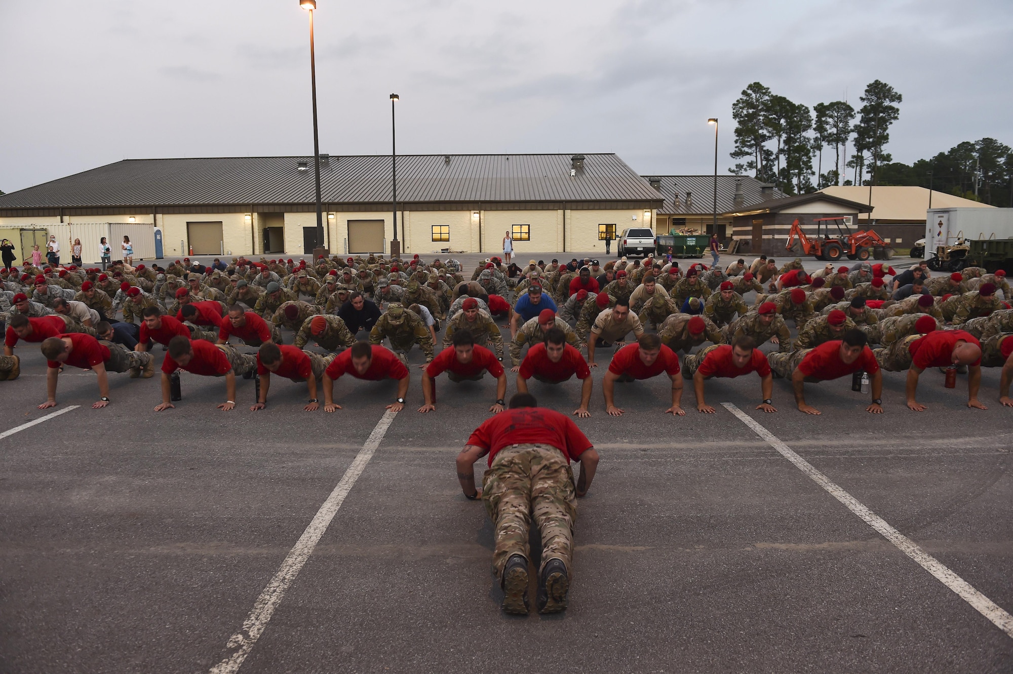 Special Tactics Airmen complete memorial pushups for fallen comrades after finishing an 812-mile memorial march from Texas to Florida. The memorial march is only completed when a Special Tactics Airmen is killed in action. This march was specifically in honor of Capt. Matthew Roland and Staff Sgt. Forrest Sibley, who were killed in action Aug. 26, 2015.