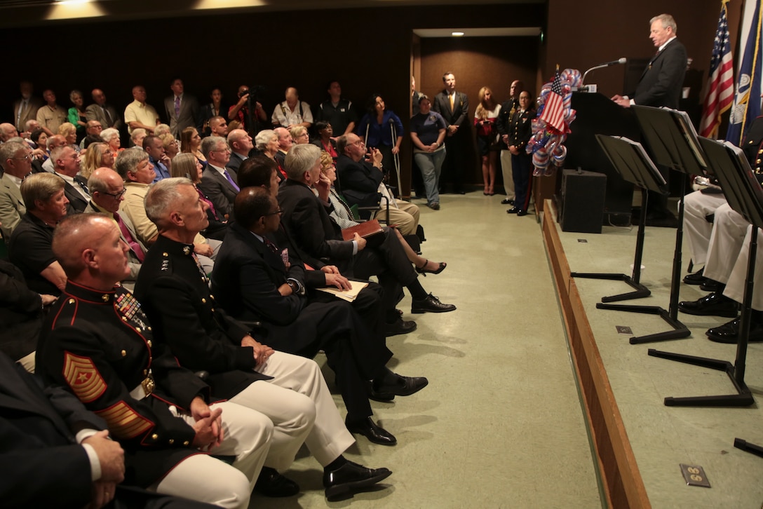 Sgt. Kenneth A. Altazan, Vietnam War veteran, speaks during his Navy Cross Medal presentation ceremony aboard the USS Kidd Veterans Museum, Baton Rouge, La., Oct. 13, 2015. Altazan received the Navy Cross medal in addition to the Silver Star medal for his effort and bravery displayed during the Vietnam War. During a medical evacuation mission, Sgt. Altazan demonstrated bravery and complete disregard for his own safety in order to save the lives of many service members. Without notifying the pilot, he jumped off of his aircraft and rescued fellow service members, carrying them back to the aircraft while under heavy enemy fire. (U.S Marine Corps photo by Corporal Ian Ferro)