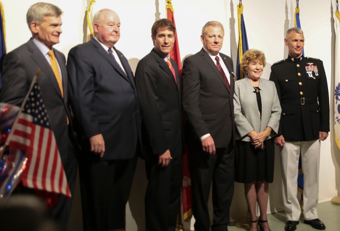 (From left to right) Senator William Cassidy, Judge Patrick Donovan, Congressman Garret Graves, Sgt. Kenneth A. Altazan, Marcy Altazan and Lt. Gen. Rex C. McMillian pose for a photo during Sgt. Altazan’s Navy Cross Medal presentation ceremony aboard the USS Kidd Veterans Museum, Baton Rouge, La., Oct. 13, 2015. Altazan received the Navy Cross medal in addition to the Silver Star medal for his effort and bravery displayed during the Vietnam War. (U.S Marine Corps photo by Corporal Ian Ferro)