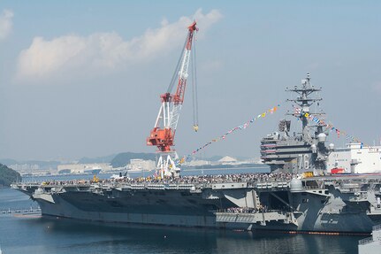 YOKOSUKA, Japan (Oct. 12, 2015) - Guests tour the U.S. Navy's only forward-deployed aircraft carrier USS Ronald Reagan (CVN 76). Ronald Reagan and Carrier Air Wing (CVW) 5 provide a combat-ready force that protects and defends the collective maritime interests of its allies and partners in the Indo-Asia-Pacific region. 