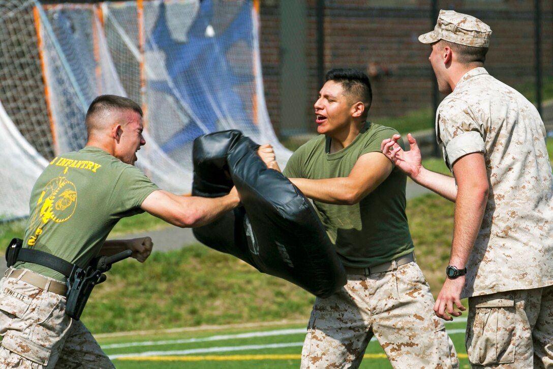 Marines perform tasks while incapacitated by oleoresin capsicum, or pepper spray, during course evaluation on Marine Barracks Washington, D.C., Oct. 8, 2015. U.S. Marine Corps photo by Cpl. Christian Varney