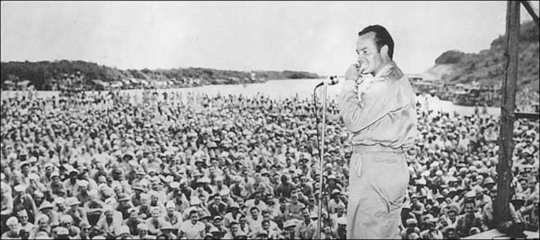 Bob Hope entertaining the troops at a USO show during World War II, 1944.