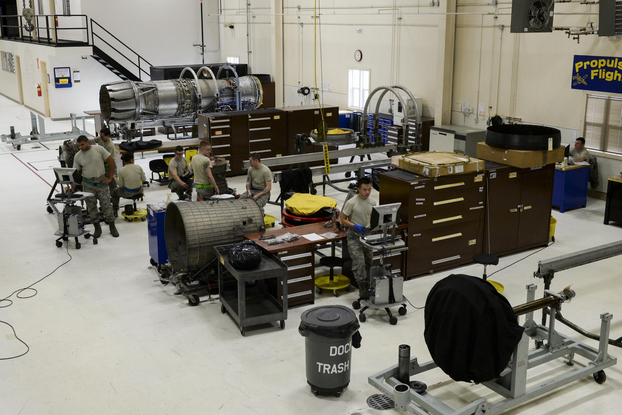 U.S. Airmen assigned to the 354th Maintenance Squadron service an F110-GE-100C jet engine Oct. 8, 2015, in the Engine Shop at Eielson Air Force Base, Alaska. The maintainers disassembled the engine and inspected every component for potential damage before starting repairs. (U.S. Air Force photo by Senior Airman Peter Reft/Released)  