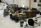 Airmen assigned to the 354th Maintenance Squadron service an F110-GE-100C jet engine Oct. 8, 2015, in the Engine Shop at Eielson Air Force Base, Alaska. The maintainers disassembled the engine and inspected every component for potential damage before starting repairs. (U.S. Air Force photo/Senior Airman Peter Reft)