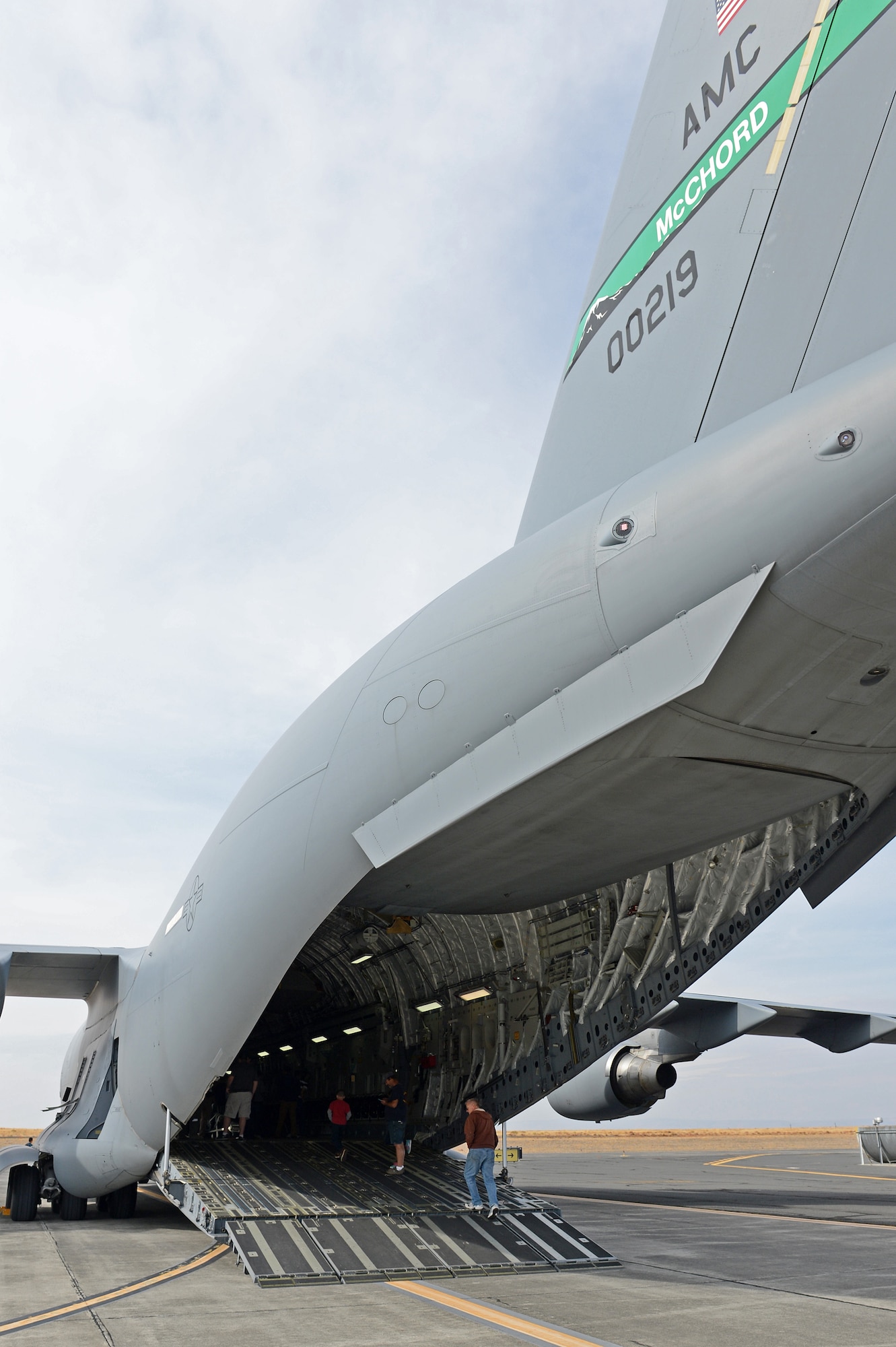 Students from Big Bend Community College and the Grant County fire department tour a C-17 Globemaster III at Moses Lake, Wash., Oct. 9, 2015. During the tour, the flight crew showed members of the fire department key functions of the aircraft, as well as how to open and close all the doors in case they have to respond to an aircraft accident. (U.S. Air Force photo/Senior Airman Divine Cox)