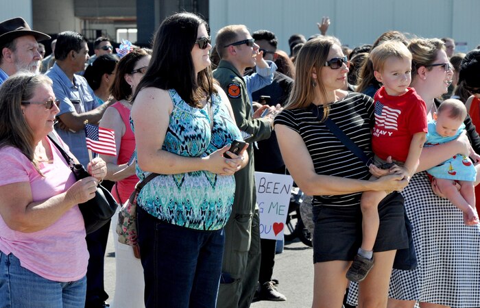 Family and friends await the arrival of deployed Airmen Oct. 13, 2015, Beale Air Force Base, California. The returning group of Airmen represent the 427th and 306th Reconnaissance Squadrons and completed the final MC-12 deployment from Beale. (U.S. Air Force photo by Staff Sgt. Jeffrey M. Schultze)