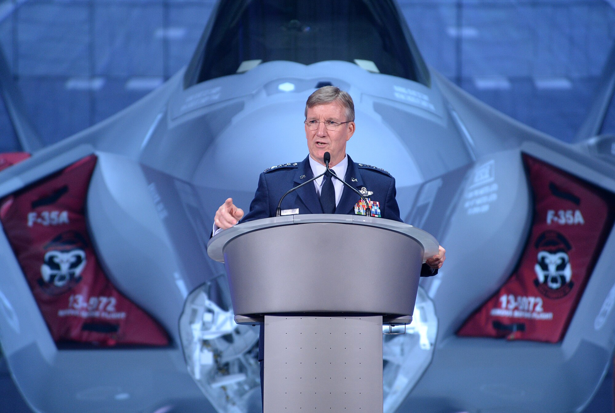 U.S. Air Force Gen. Hawk Carlisle, commander of Air Combat Command, speaks at the arrival ceremony for the F-35 Lightning II at Hill Air Force Base, Utah Oct. 14. The ceremony marked the formal beginning of F-35 operations at Hill, and commemorated the arrival of the first combat-coded F-35 aircraft which arrived at Hill Sept. 2. (U.S. Air Force photo by R. Nial Bradshaw/Released)