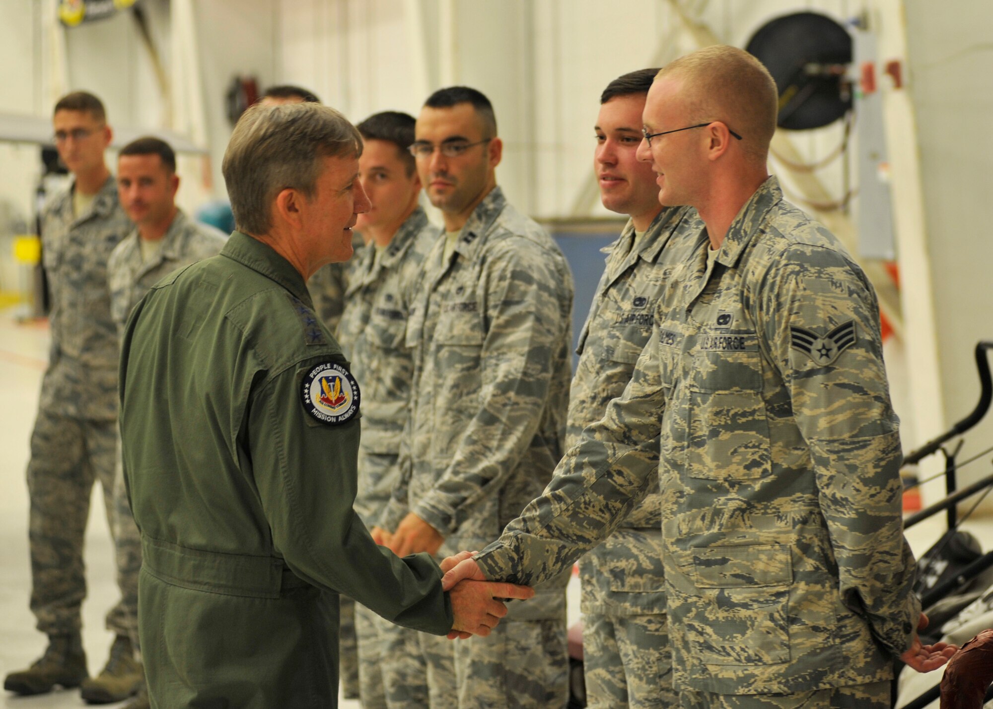 U.S. Air Force Gen. Hawk Carlisle, commander of Air Combat Command, meets and greets Team Tyndall Airmen Oct. 6 at the 43rd Fighter Squadron Hangar. Carlisle visited Tyndall to personally thank the men and women who made the first ever Rapid Raptor to U. S. Air Forces in Europe training deployment happen. (U.S. Air Force photo by Airman 1st Class Sergio A. Gamboa/Released)