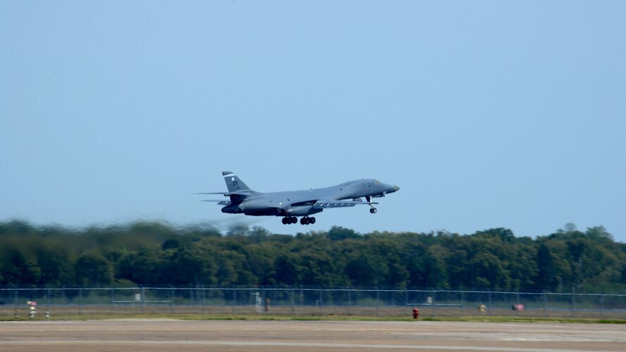 A B-1 Lancer takes flight at Barksdale Air Force Base, La., Oct. 8, 2015. Aircrew from the 7th Bomb Wing, Dyess AFB, Texas, ferried the aircraft here for 77th Weapons Squadron students and instructors to fly in the live-fly portion of a cruise missile integration exercise. The exercise aimed to achieve two specific objectives. The first was to educate weapons school students on cruise missile employment considerations and existing processes for planning and integrating cruise missiles. The second was to advance the development those planning processes in an attempt to make cruise missile attacks more effective and more efficient against a modern adversary. (U.S. Air Force photo/Airman 1st Class Curt Beach)