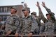 Sheppard Air Force Base, Texas, Airmen cheer the Midwestern State university football tam during the opening kick-off at Wichita Falls Memorial Stadium, Wichita Falls, Texas, Oct. 10, 2015. Sheppard Airmen and Soldiers from Ft. Sill, Okla., were invited to the military appreciation game to cheer on the Mustangs in their 24-17 win over West Texas A&M. (U.S. Air Force photo/Tech. Sgt. Mike Meares)