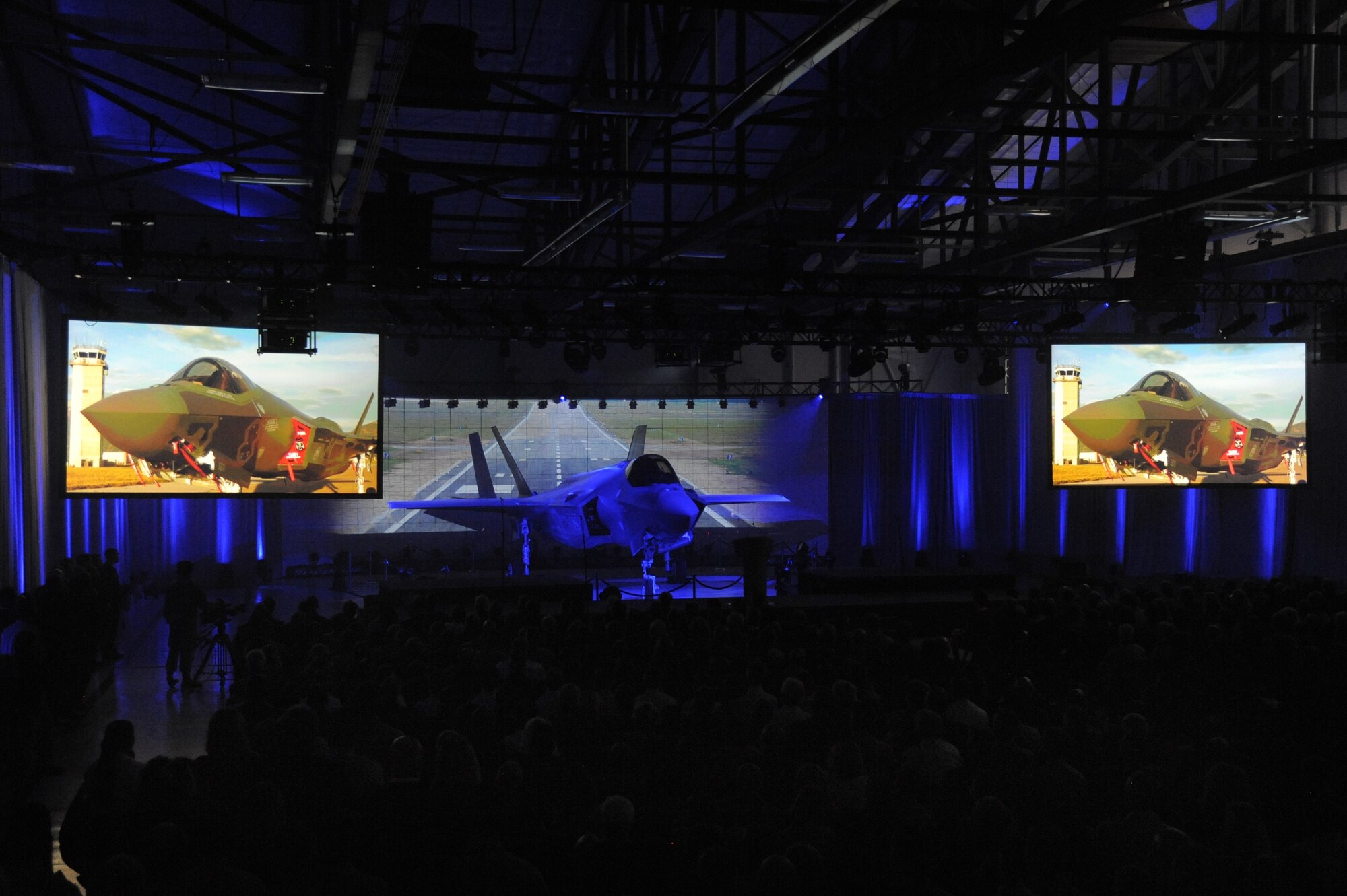 An F-35A Lightning II aircraft is bathed in light during an unveiling ceremony at Hill Air Force Base, Utah, Oct. 14, 2015. The unveiling commemorated the arrival of the Lightning II to the base. The 388th and 419th Fighter Wings at Hill were selected as the first Air Force units to fly combat-coded F-35s. (U.S. Air Force photo by Todd Cromar/Released)