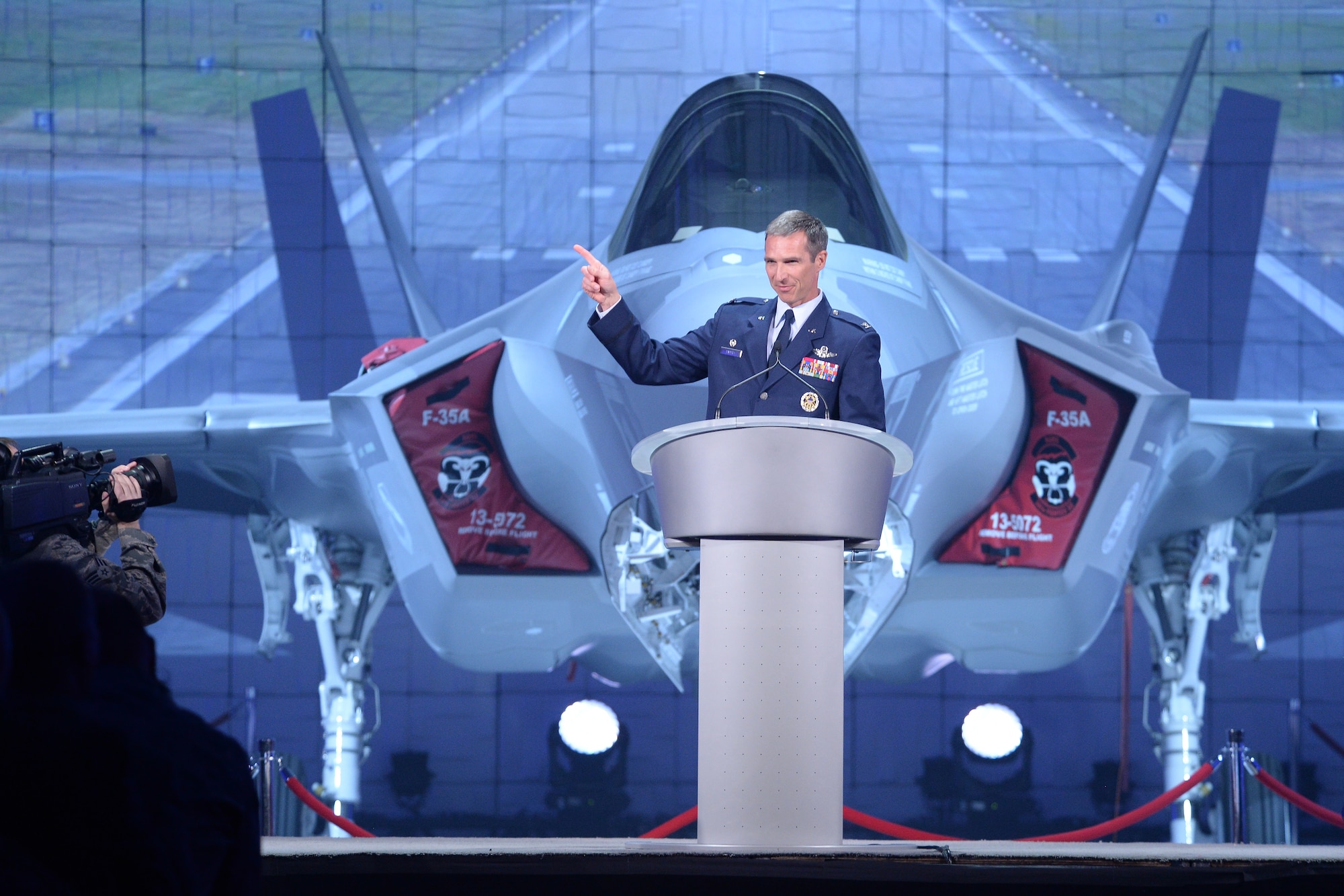 Col. Bryan Radliff, 419th Fighter Wing commander, speaks to Airmen, Air Force leaders, Utah elected officials, and members of the local community during the F-35 arrival ceremony at Hill Air Force Base, Utah, Oct. 14. The ceremony, hosted by Lockheed Martin, marked the beginning of F-35 operations at the 419th FW alongside its active-duty counterparts in the 388th FW. (U.S. Air Force photo/R. Nial Bradshaw)