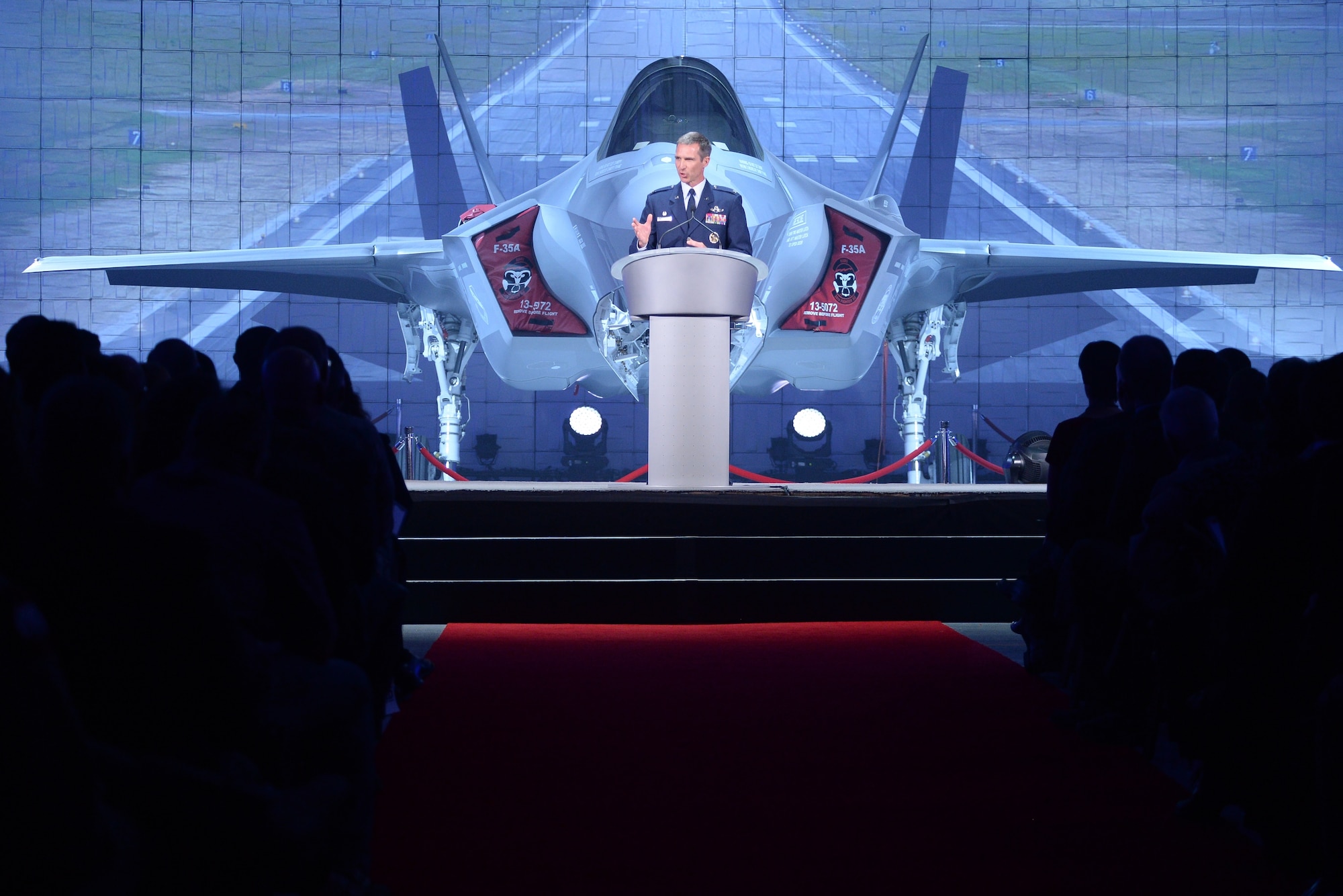 Col. Bryan Radliff, 419th Fighter Wing commander, makes closing remarks during an F-35A Lightning II aircraft unveiling ceremony Oct. 14 at Hill Air Force Base, Utah. The ceremony marked the formal beginning of F-35 operations at Hill, and commemorated the arrival of the first combat-coded F-35 aircraft at the base. Hill will receive a total of 72 F-35s on a staggered basis through 2019.  The jets will be flown and maintained by Hill Airmen assigned to the active-duty 388th Fighter Wing and its Reserve component 419th Fighter Wing. (U.S. Air Force photo by R. Nial Bradshaw /Released)