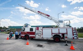A fire truck from the Joint Base Charleston Fire Department is displayed in front of the Navy Exchange Oct. 8, 2015, on JB Charleston – Weapons Station, S.C. Fire prevention week was Oct. 4 through Oct. 10, and the JB Charleston Fire Department hosted several events around the Air Base and Weapons Station. Fire prevention week was established in 1925 by President Calvin Coolidge when close to 15,000 American citizens died in fires the previous year. (U.S. Air Force photo/Airman 1st Class Clayton Cupit)