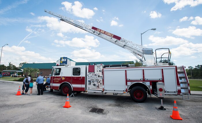 A fire truck from the Joint Base Charleston Fire Department is displayed in front of the Navy Exchange Oct. 8, 2015, on JB Charleston – Weapons Station, S.C. Fire prevention week was Oct. 4 through Oct. 10, and the JB Charleston Fire Department hosted several events around the Air Base and Weapons Station. Fire prevention week was established in 1925 by President Calvin Coolidge when close to 15,000 American citizens died in fires the previous year. (U.S. Air Force photo/Airman 1st Class Clayton Cupit)