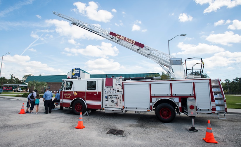 A fire truck from the Joint Base Charleston Fire Department is displayed in front of the Navy Exchange Oct. 8, 2015, on JB Charleston – Weapons Station, S.C. Fire prevention week was Oct. 4 through Oct. 10, and the JB Charleston Fire Department hosted several events around the Air Base and Weapons Station. Fire prevention week was established in 1925 by President Calvin Coolidge when close to 15,000 American citizens died in fires the previous year. (U.S. Air Force photo/Airman 1st Class Clayton Cupit)