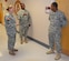 U.S. Army Lt. Col. Heidi Mon, McDonald Army Health Center commander, right, takes a ‘selfie’ with surgical team members at Fort Eustis, Va., June 4, 2015. Mon regularly visits with MCAHC personnel to learn about their jobs and view the technical aspects of the various medical positions that make up the center. (U.S. Army courtesy photo/Released)