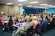 Airmen and local community members participate in a Breast Cancer and Domestic Violence Awareness luncheon, Oct. 8, 2015, at Moody Air Force Base, Ga. The event was designed to raise awareness about breast cancer and domestic violence and how to seek help if affected by them. (U.S. Air Force photo by Airman 1st Class Greg Nash/Released)