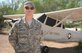 U.S. Air Force Tech. Sgt. Henry Crankshaw, 755th Operations Support Squadron NCO in charge of aircrew flight equipment quality assurance, stands in front of a Cessna O-1F Bird Dog at Davis-Monthan Air Force Base, Ariz., Oct. 13, 2015. Crankshaw served as a life support investigator for recovery team 3 during a Defense POW MIA (prisoner of war missing in action) Accounting Agency mission from May 12 to June 18, 2014. Crankshaw and his team were assigned to an O-1F aircraft crash site located in the Quang Tri Province of Vietnam. The team was able to identify the pilot of the aircraft and bring him home to the U.S. (U.S. Air Force photo by Senior Airman Cheyenne A. Powers/ Released)