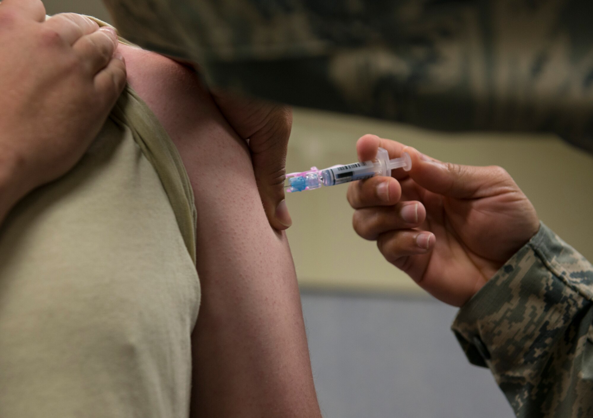 The 87th Medical Group held a flu shot day, Oct. 14, to ensure that all active duty military members receive their flu shots on time. They gave the flu shots at the logistics readiness squadron on Joint Base McGuire-Dix-Lakehurst, N.J. The 87th MDG gave XXX flu shots throughout the day. If you have not received your flu shot be sure to get it soon. (U.S. Air Force photo by Airman 1st Class Joshua King)