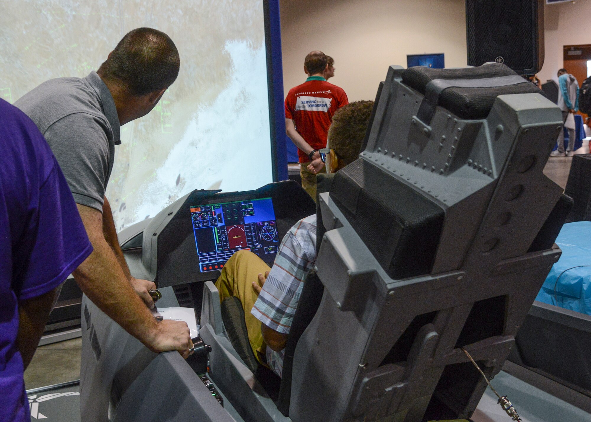 The 412th Test Engineering Group Instrumentation Division wowed students with their F-16 simulator at the 2015 Salute to Youth Event. (U.S. Air Force photo by Rebecca Amber)