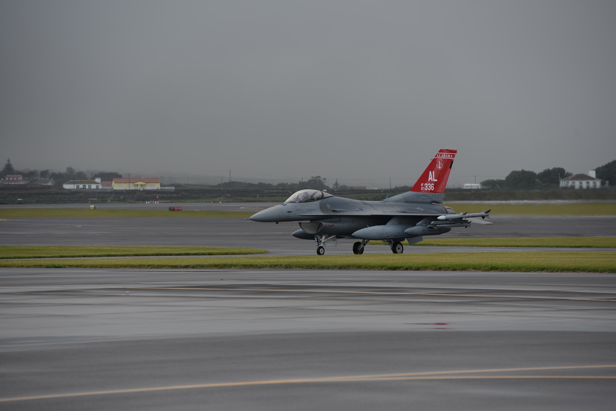 An F-16 from the 100th Fighter Squadron, Montgomery Air National Guard Base, Alabama, transited Lajes Field October 9, 2015. Members of the 100th Fighter Squadron are traveling to Romania to conduct an exercise and training. (U.S. Air Force Photo/Senior Airman Jayson Santoyo)